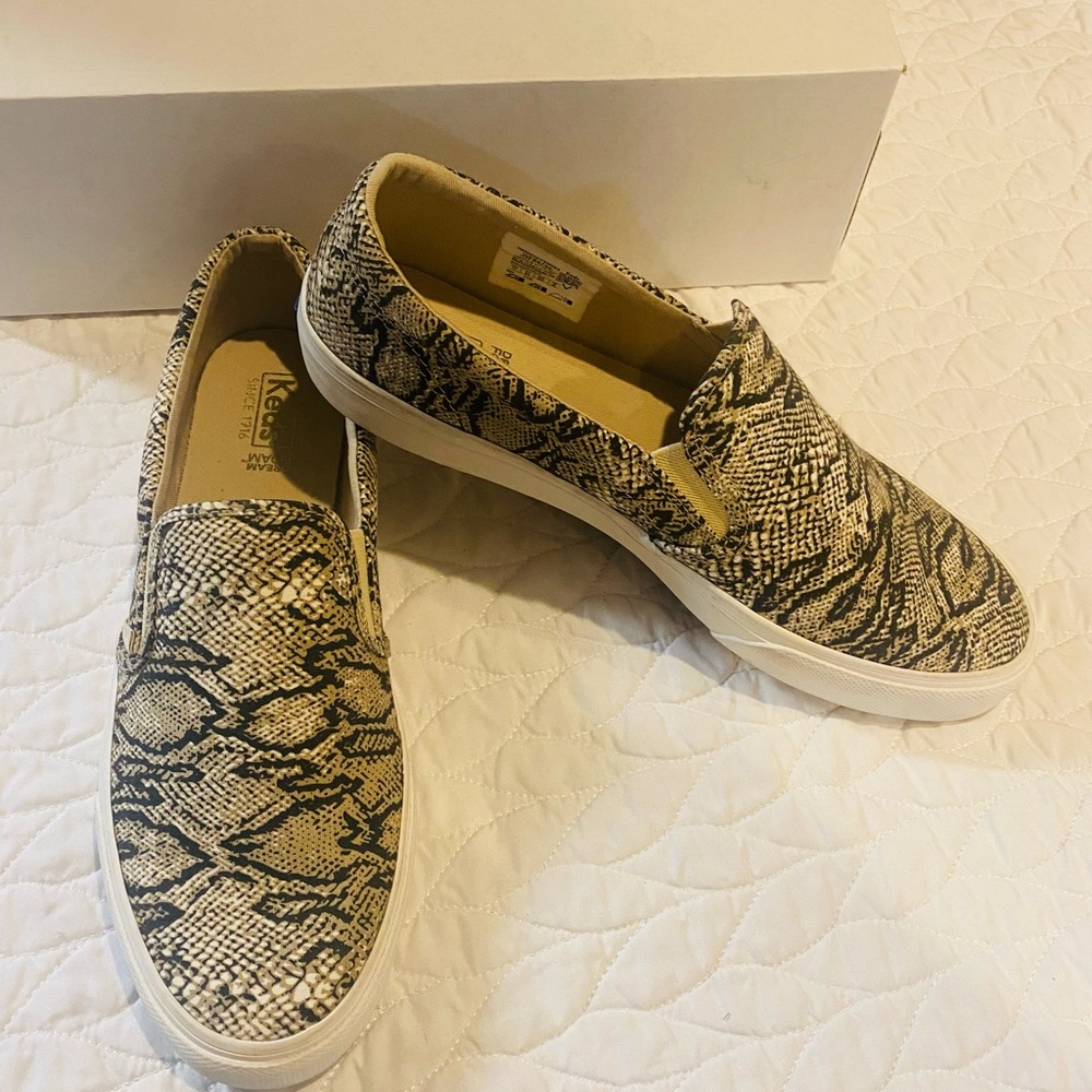 Keds Snake-Print Slip-On Sneakers in Beige and Black